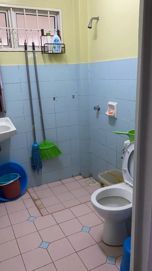 Before: original bathroom with blue wall tiles