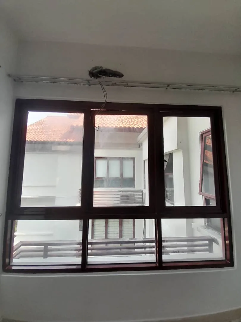Process — Brown frame window grille